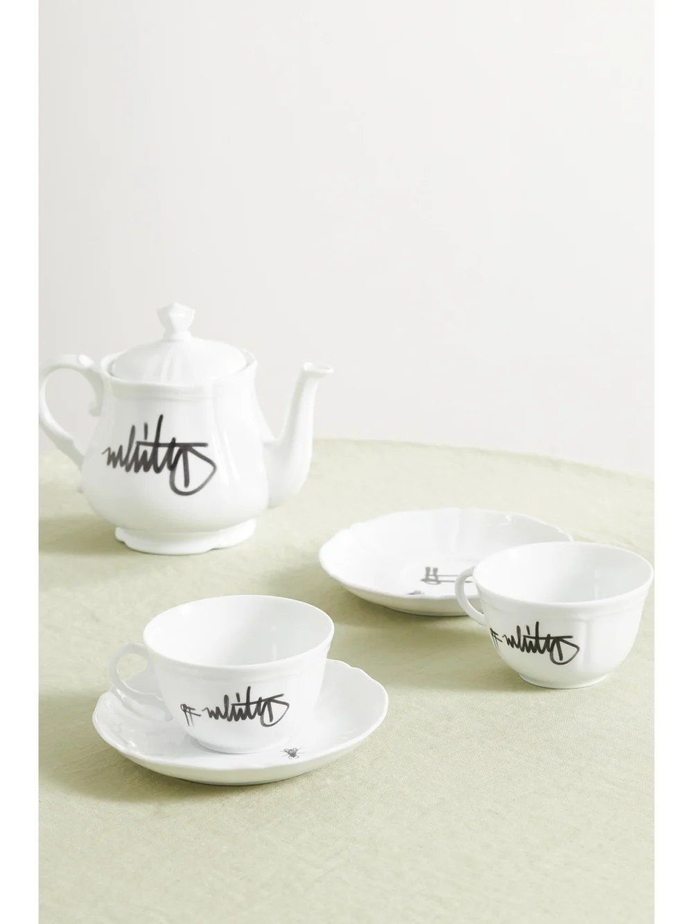 Ginori + Off-white Printed Porcelain Tea Cup and Saucer Set, styled view