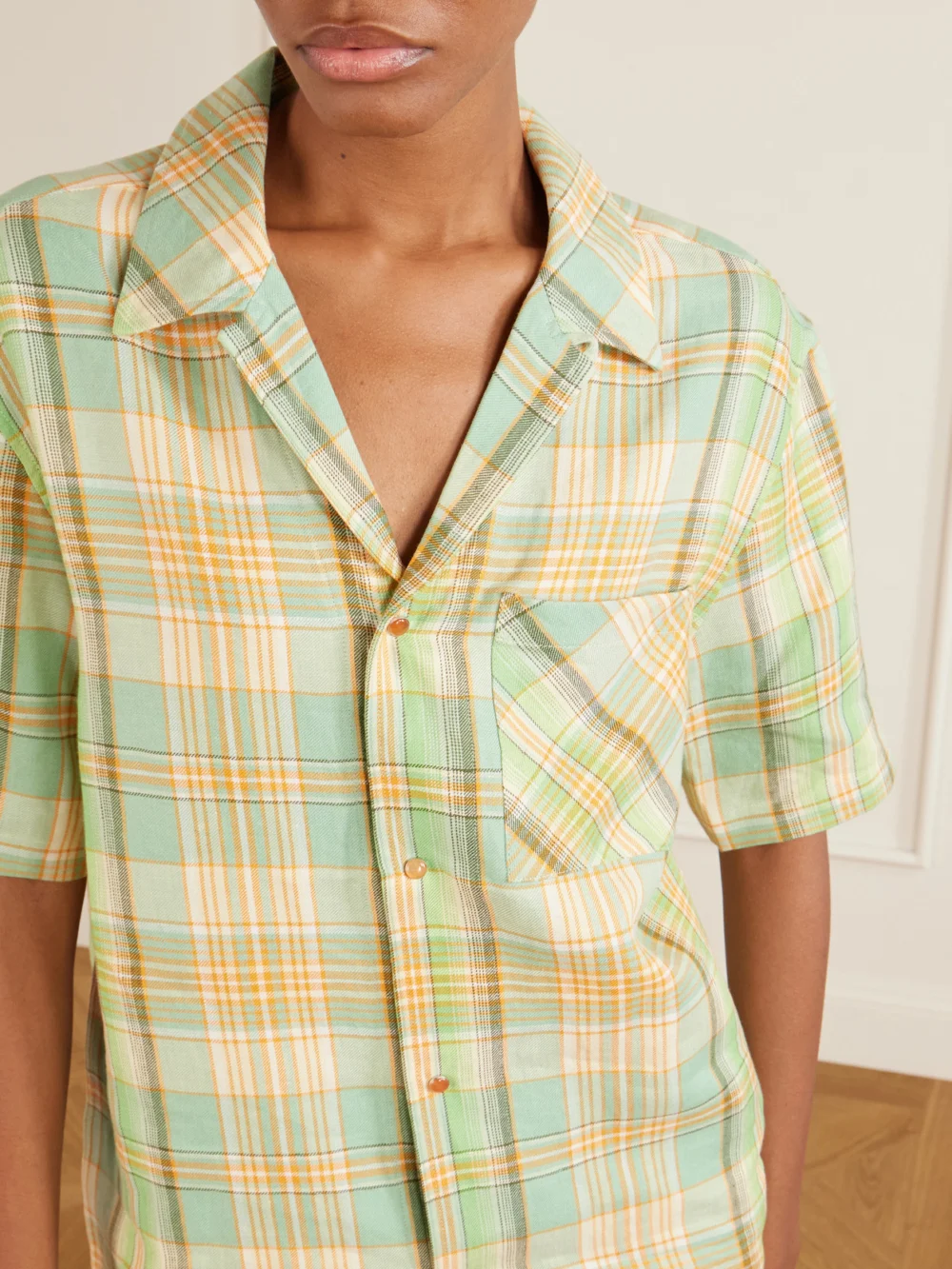 Close-up detail of the God’s True Cashmere Lime Moss Checked Linen Shirt