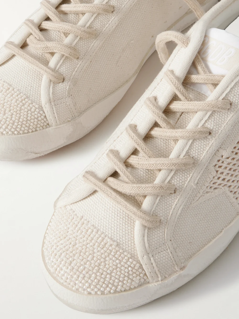 Close-up detail of the Golden Goose Super-star Leather-trimmed Bead-embellished Canvas Sneakers