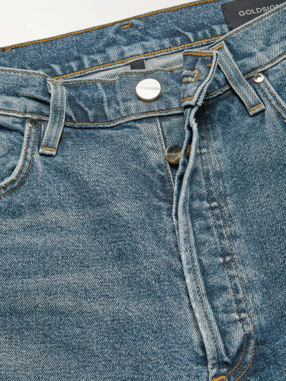 Close-up detail of the Goldsign Lawler High-rise Slim-leg Jeans