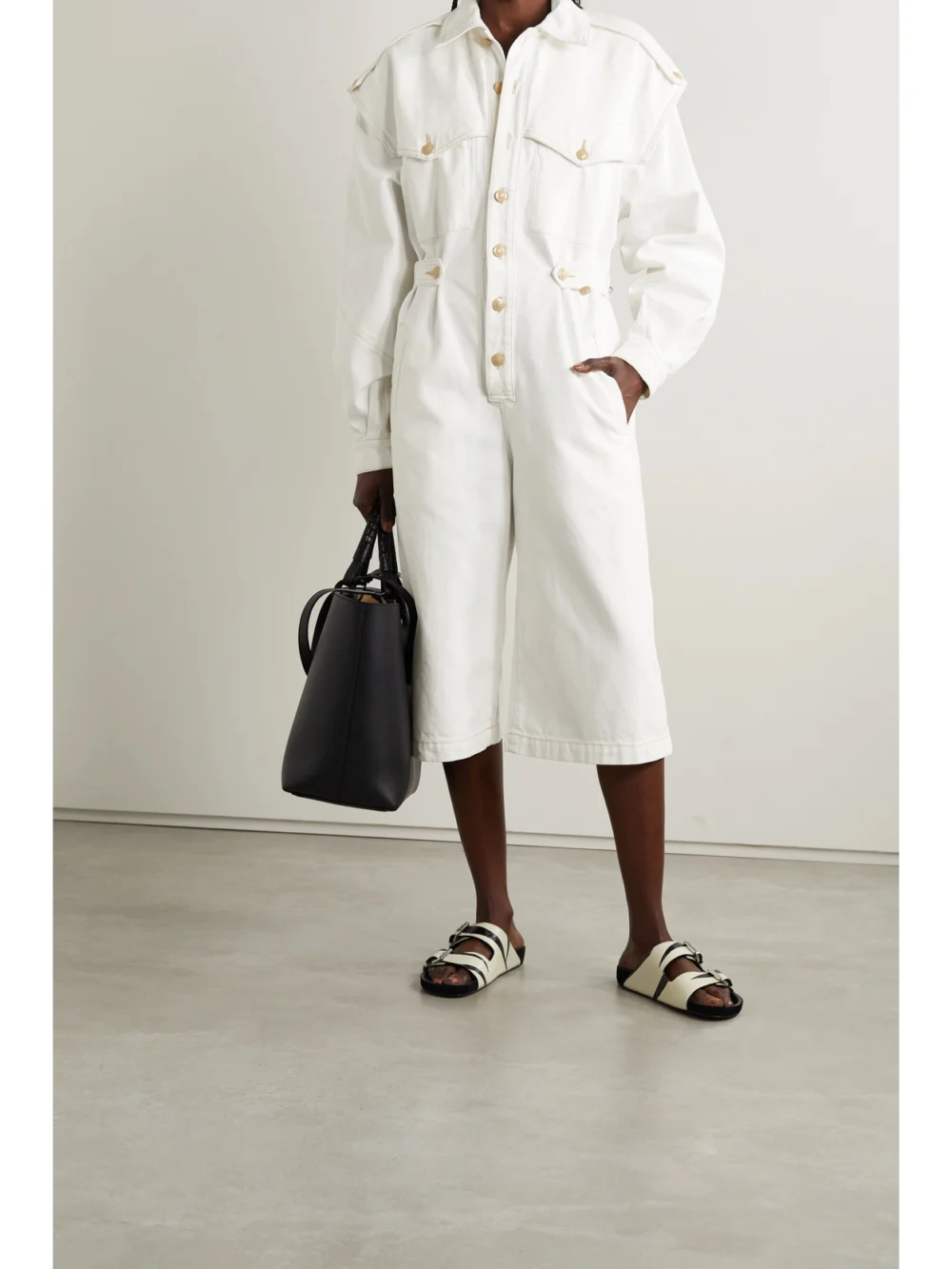Goldsign The Cullotte Cropped Denim Jumpsuit, worn by a model