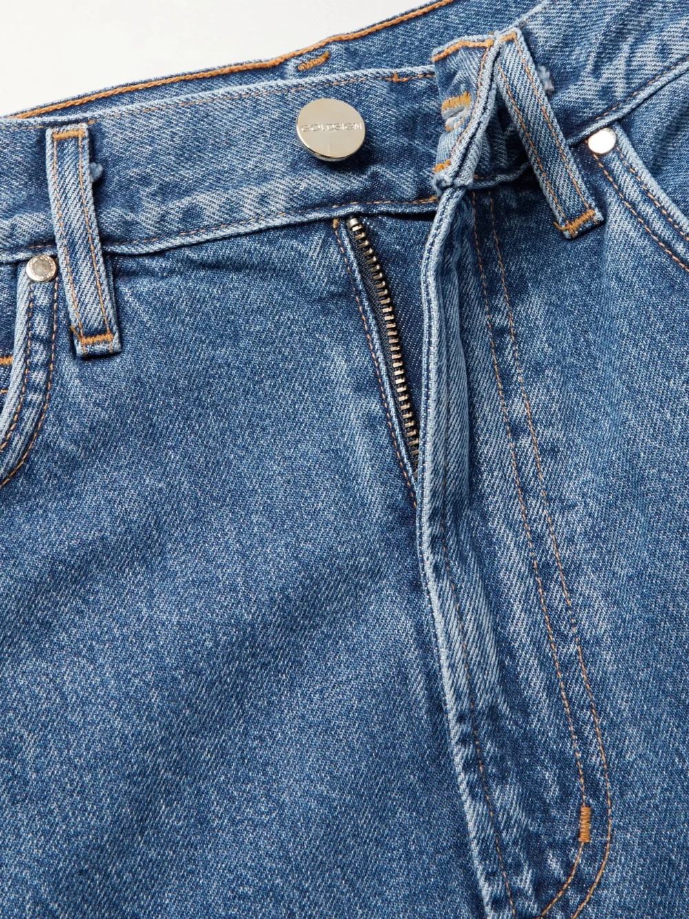 Close-up detail of the Goldsign The Gaucho Organic High-rise Wide-leg Jeans