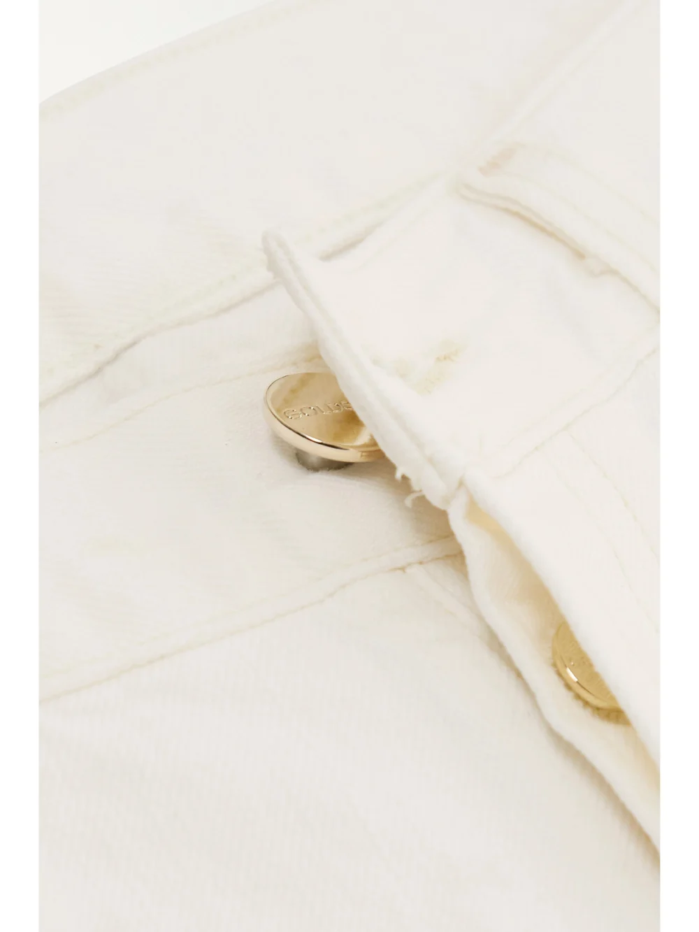 Close-up detail of the Goldsign The Nineties High-rise Bootcut Jeans