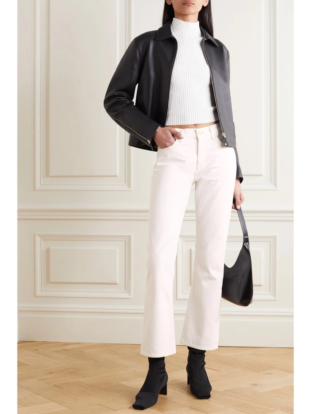 Goldsign The Nineties High-rise Bootcut Jeans, worn by a model