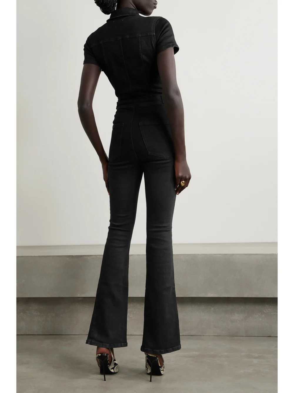 Back view of the Good American Fit for Success Stretch-denim Jumpsuit