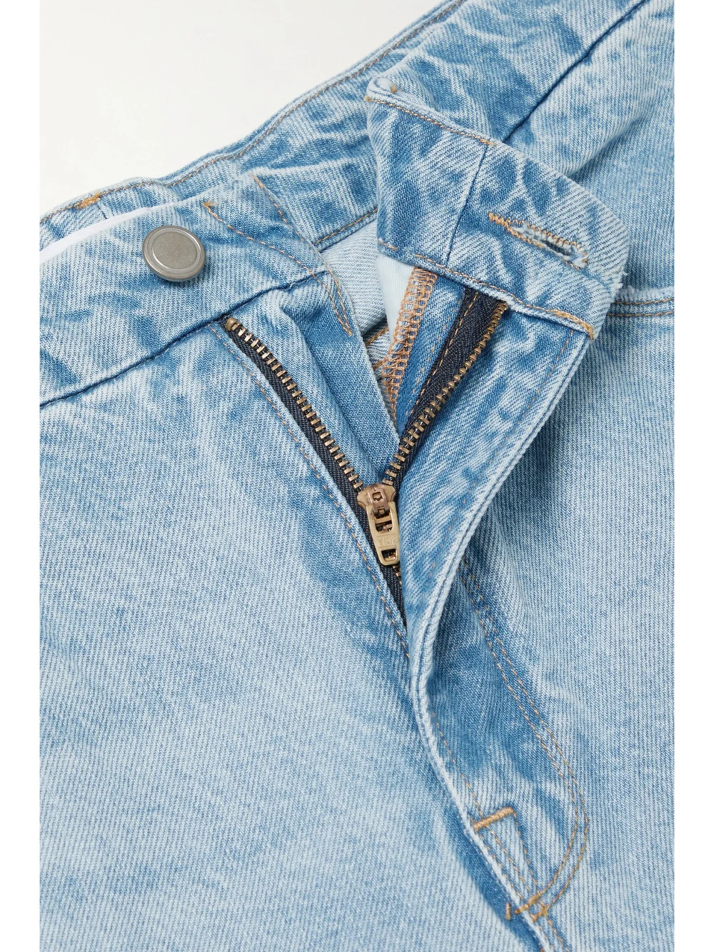 Close-up detail of the Good American Good 90s High-rise Wide-leg Jeans