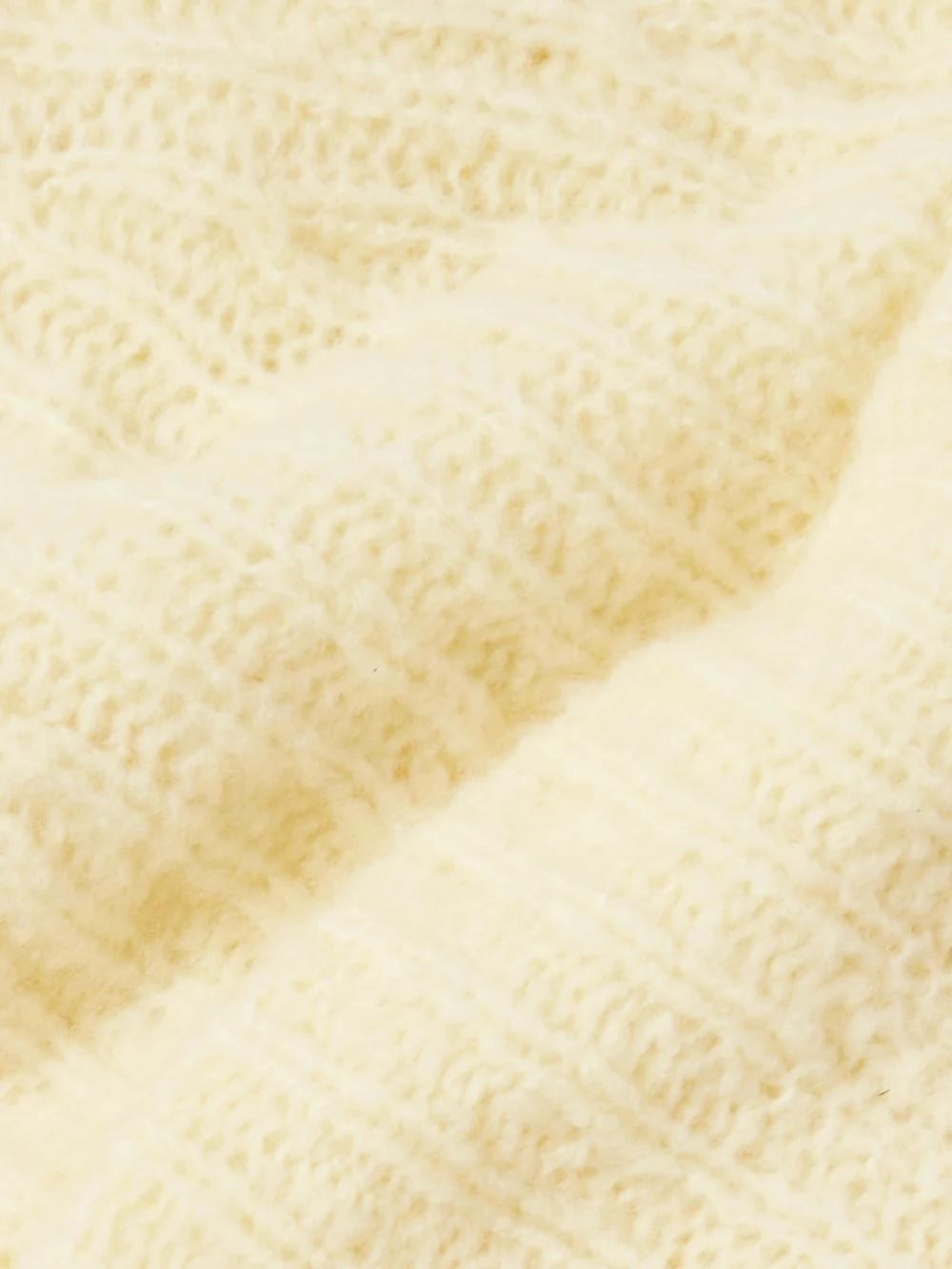 Close-up detail of the Guest In Residence Cloud Ribbed Merino Wool-blend Beanie