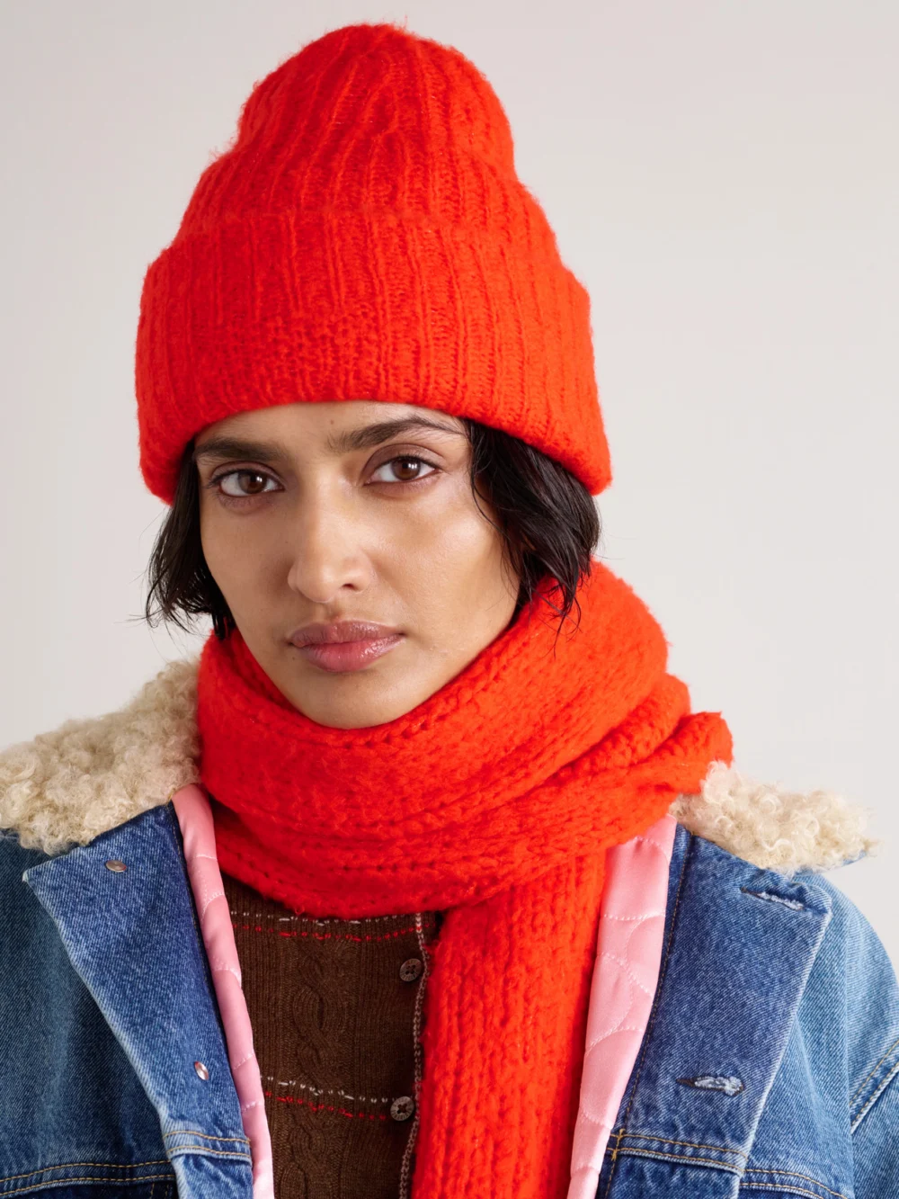 Guest In Residence Cloud Ribbed Merino Wool-blend Beanie, styled view