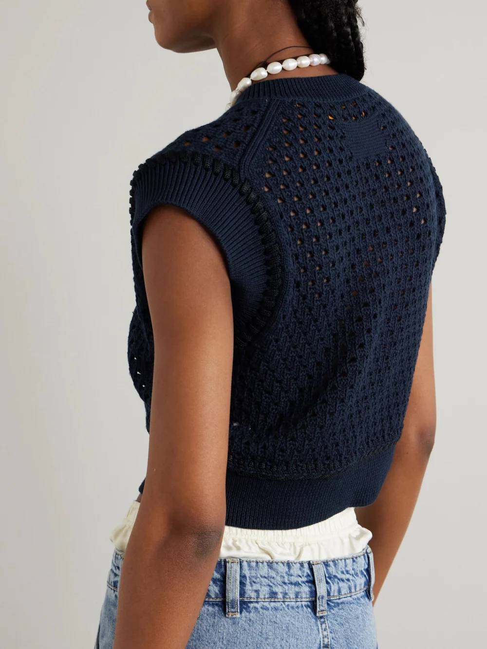 Back view of the Guest In Residence Cropped Open-knit Cotton Vest