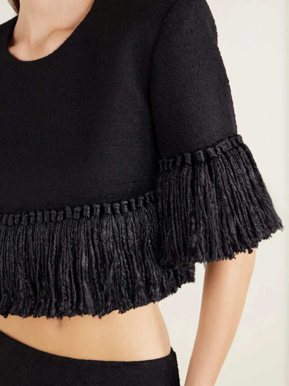 Close-up detail of the Heirlome Matilde Bouclé Fringed Wool-blend Blouse