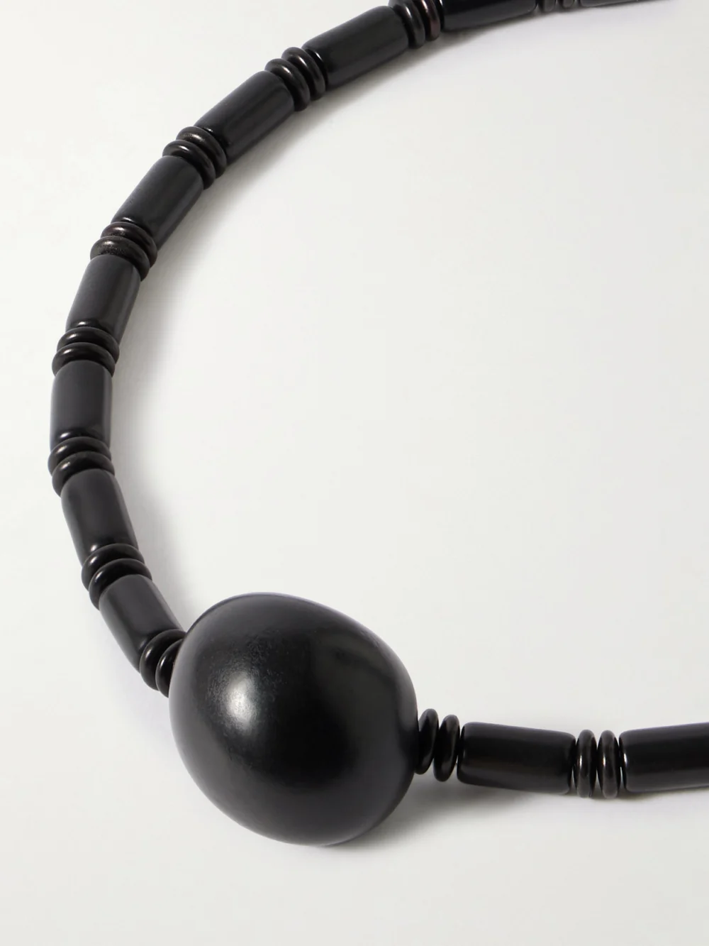 Close-up detail of the Hunting Season The Choker Tagua and Leather Necklace