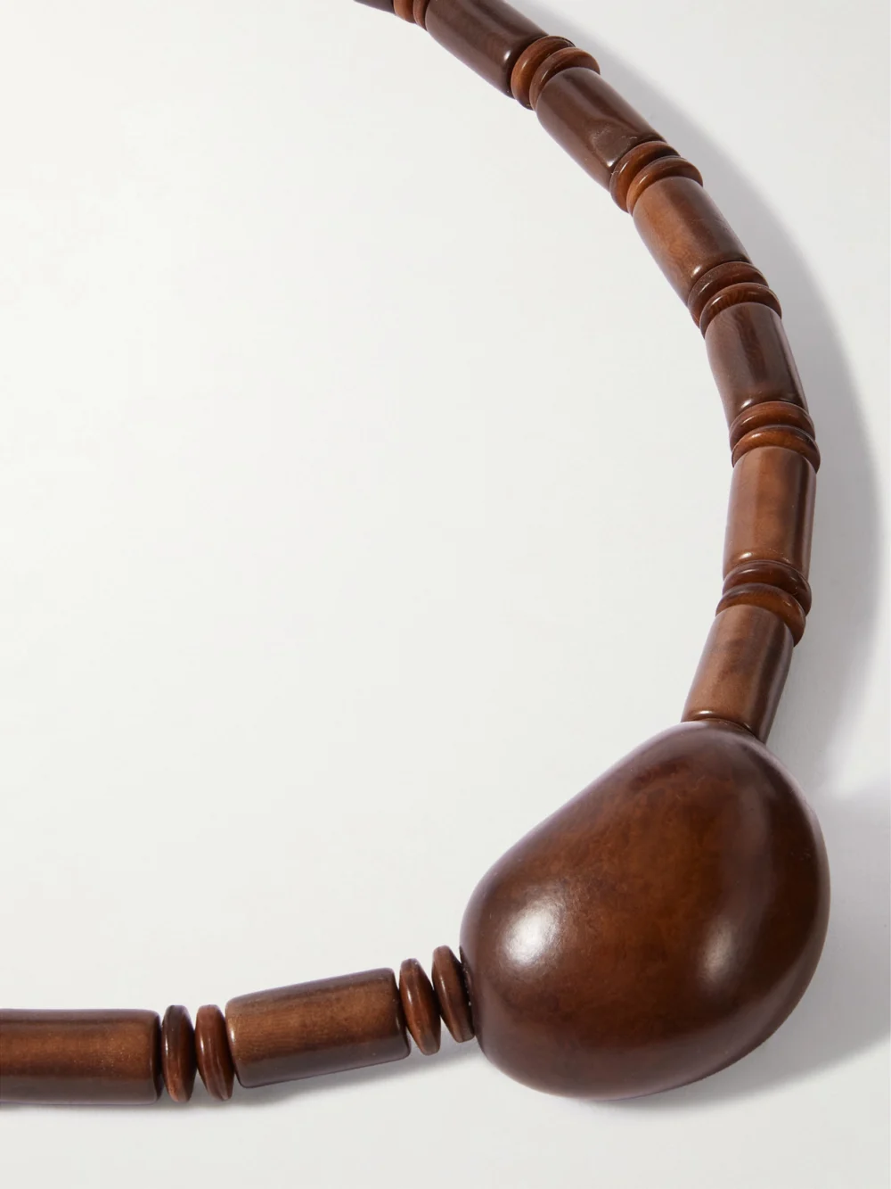 Close-up detail of the Hunting Season The Choker Tagua and Leather Necklace