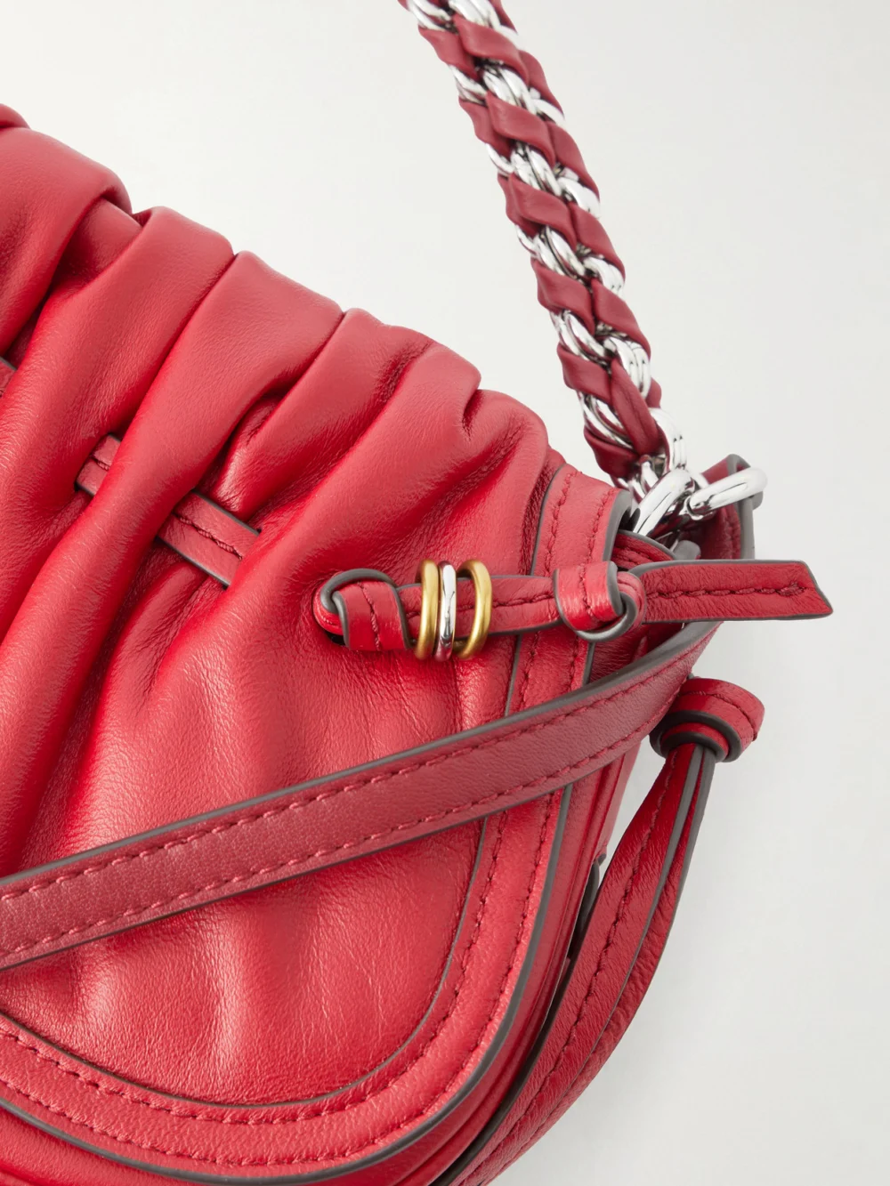 Close-up detail of the Isabel Marant Bolton Embellished Gathered Leather Shoulder Bag