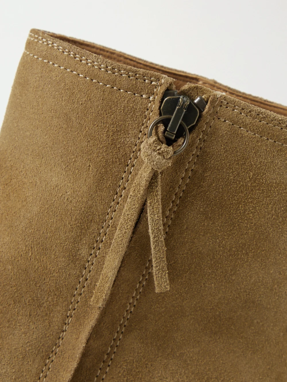 Close-up detail of the Isabel Marant Deone Suede Ankle Boots
