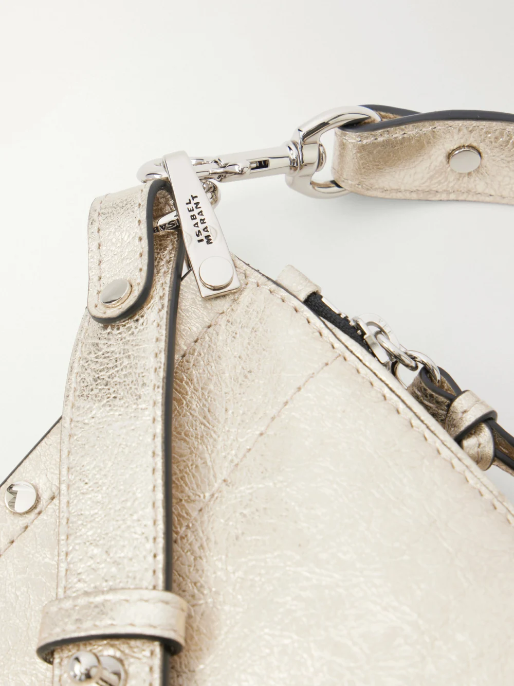 Close-up detail of the Isabel Marant Oskan Embellished Metallic Leather Shoulder Bag