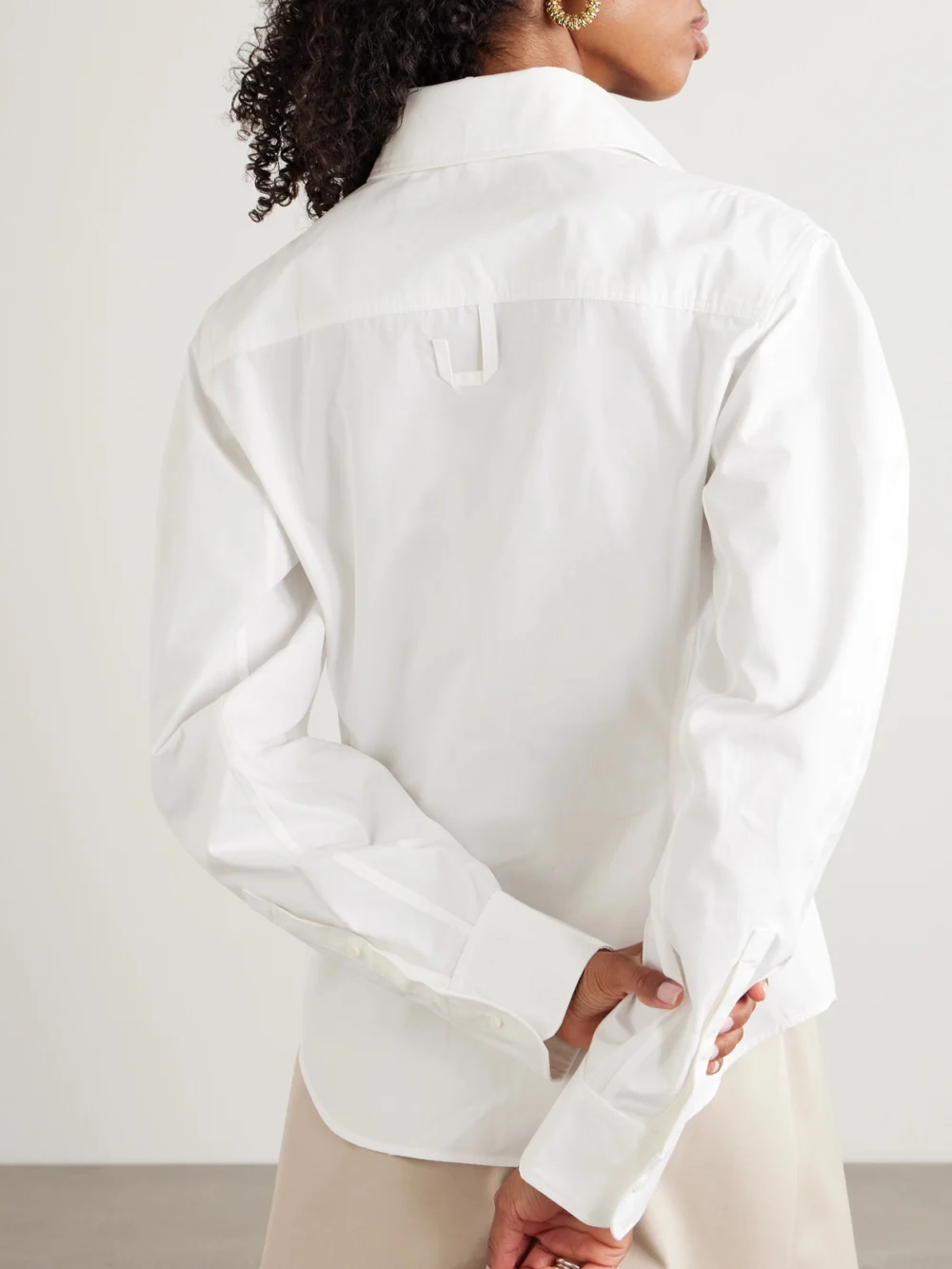 Back view of the Jacquemus Ovalo Embroidered Cotton-poplin Shirt