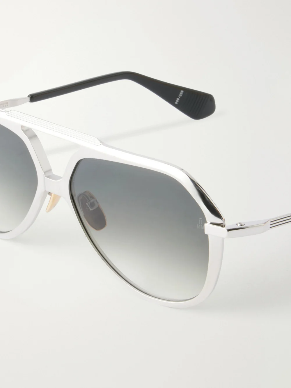 Close-up detail of the Jacques Marie Mage + Lou Lou De La Falaise Louise Aviator-style Titanium Sunglasses