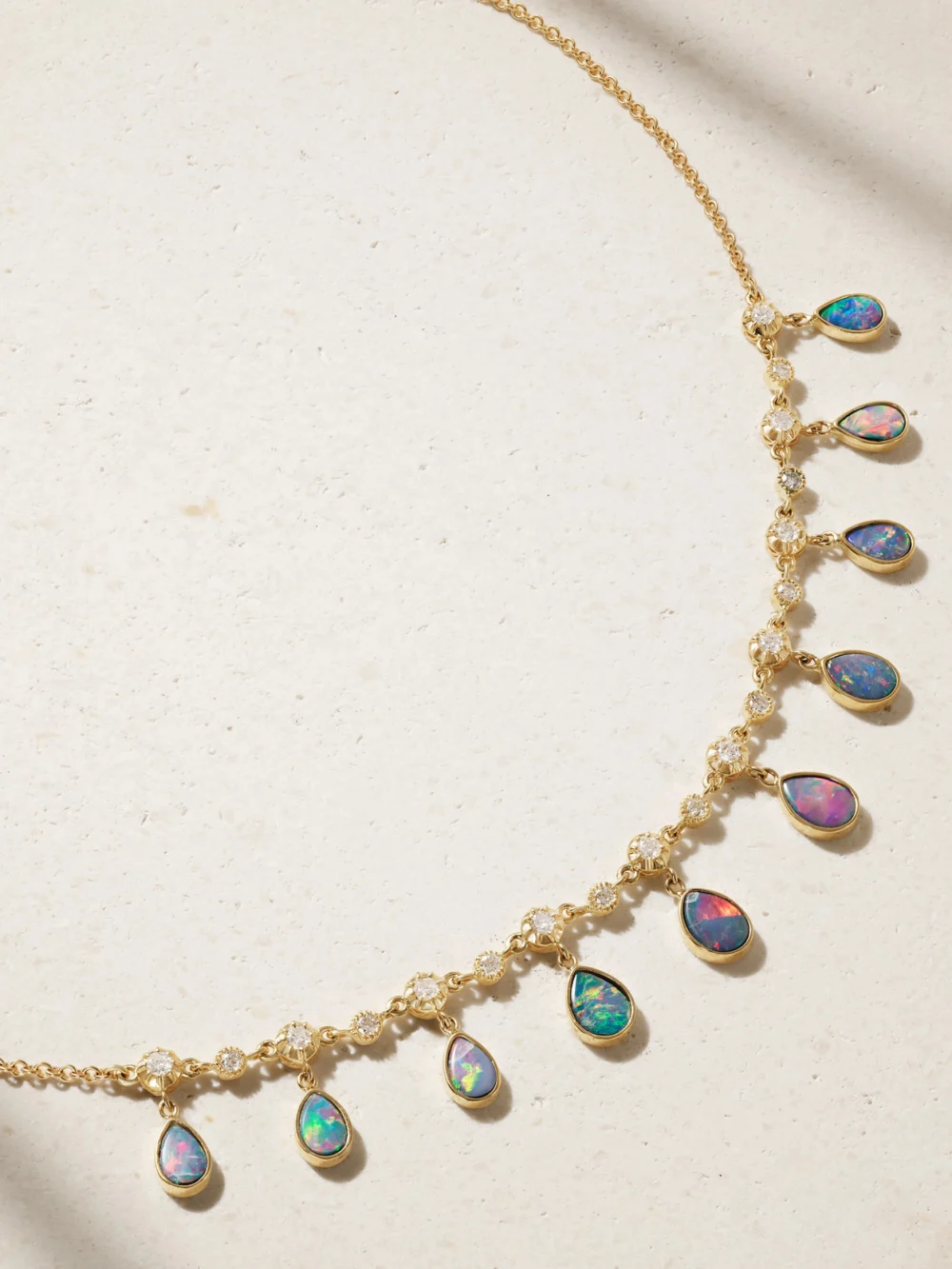 Close-up detail of the Jacquie Aiche Shaker 14-karat Gold, Diamond and Opal Necklace