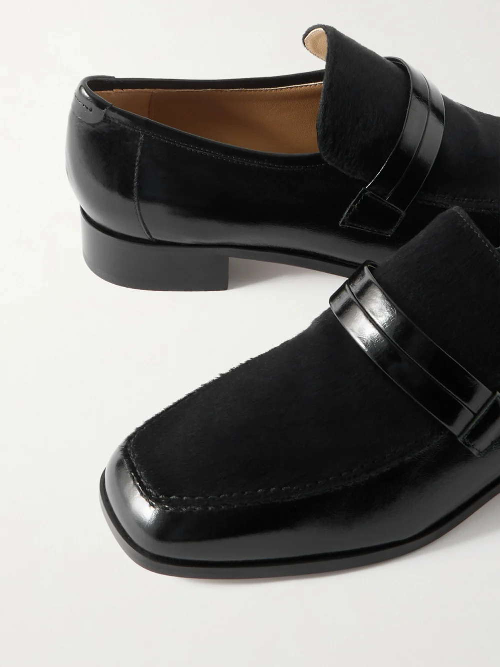 Close-up detail of the Jamie Haller Mod Calf Hair and Glossed-leather Loafers