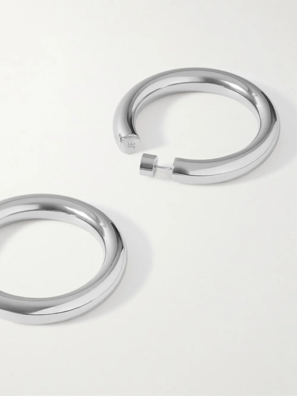 Close-up detail of the Jennifer Fisher Jamma Baby Silver-plated Hoop Earrings