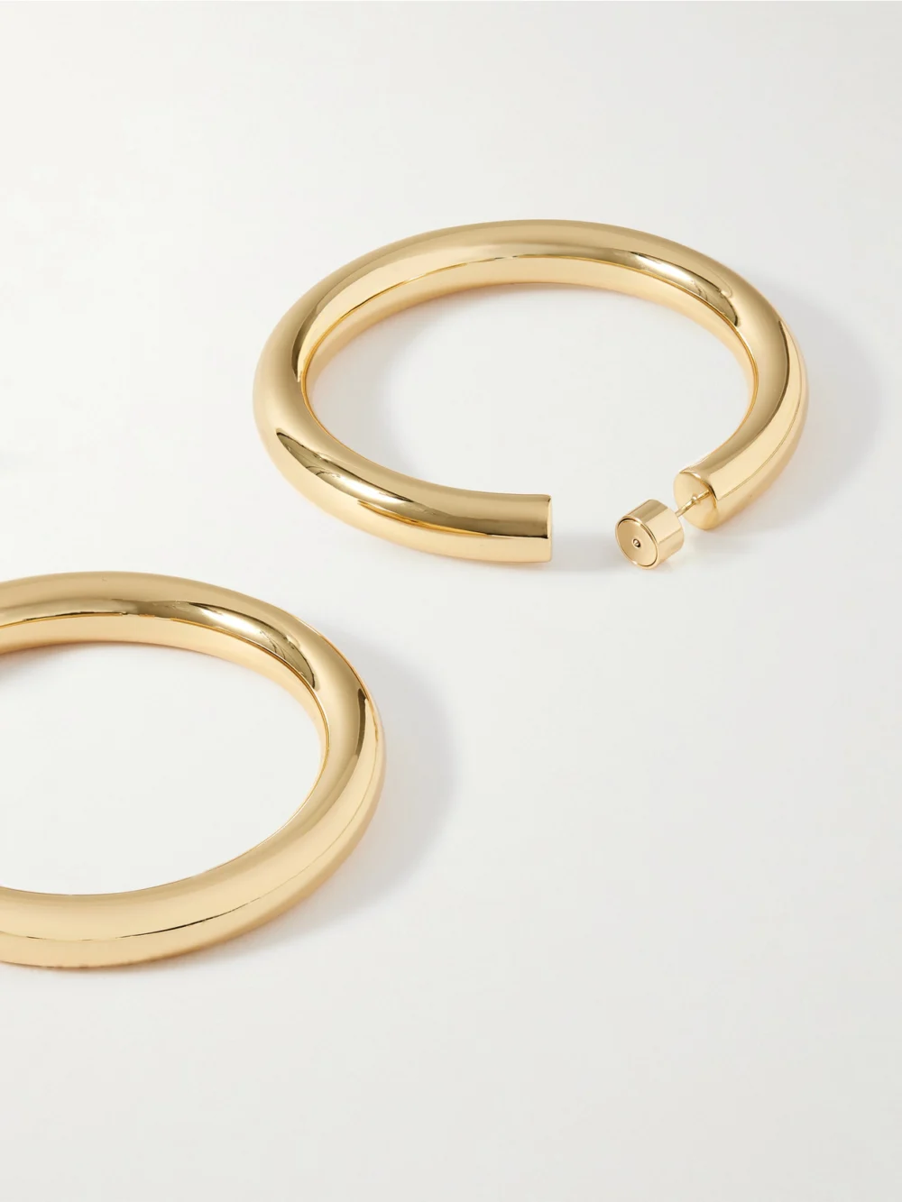 Close-up detail of the Jennifer Fisher Jamma Gold-plated Hoop Earrings