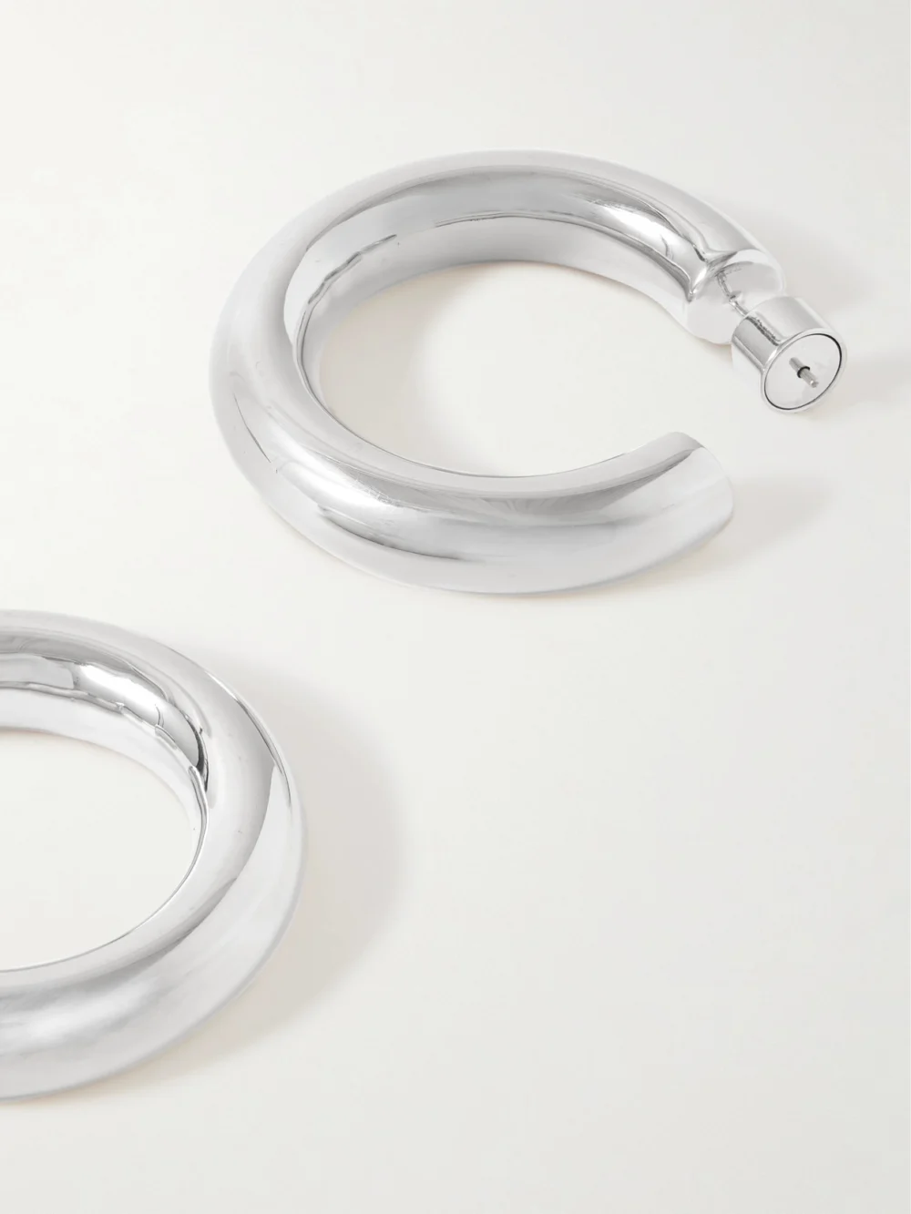 Close-up detail of the Jennifer Fisher Jamma Mini Silver-plated Hoop Earrings
