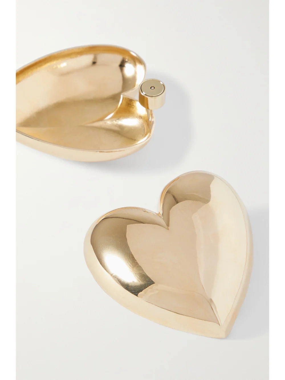 Close-up detail of the Jennifer Fisher Puffy Heart Gold-plated Earrings