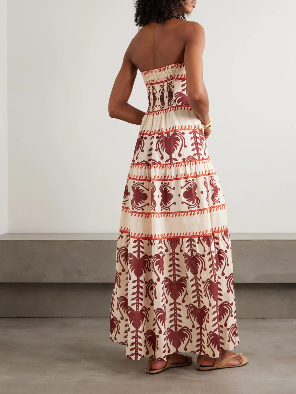 Back view of the Johanna Ortiz Another Chance Strapless Tiered Embellished Printed Linen Maxi Dress