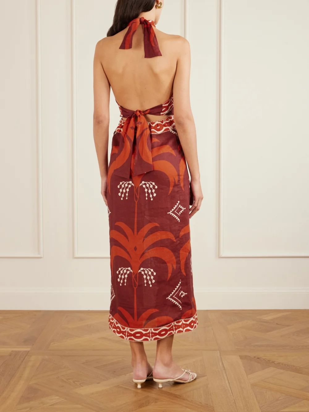 Back view of the Johanna Ortiz Cutout Printed Linen Halterneck Maxi Dress
