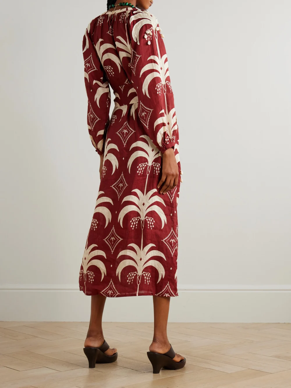 Back view of the Johanna Ortiz Weaving Waves Belted Embellished Printed Linen Midi Dress