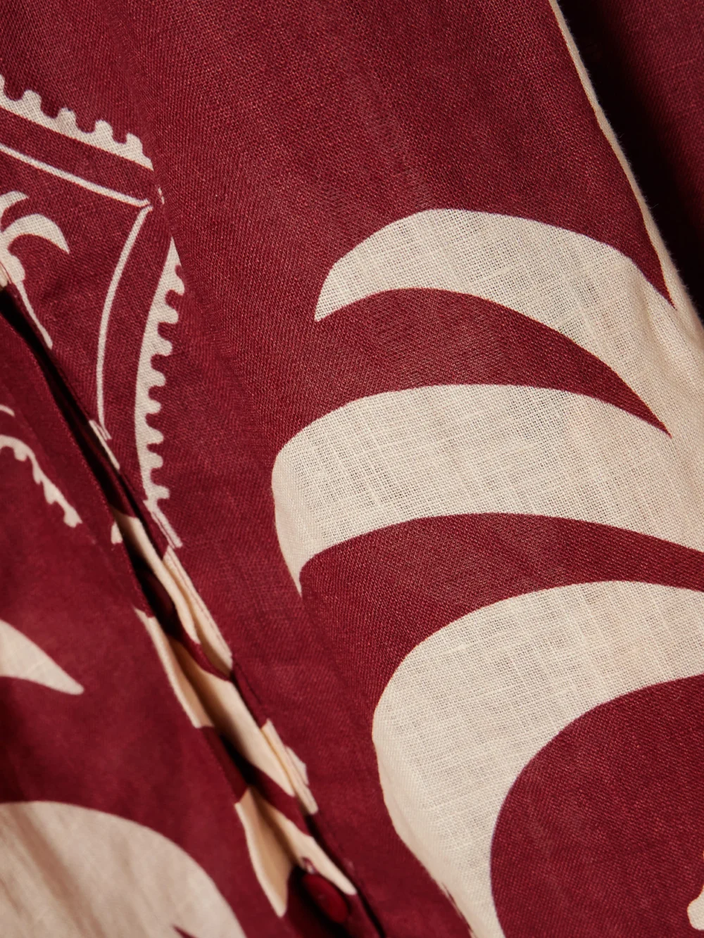 Close-up detail of the Johanna Ortiz Weaving Waves Belted Embellished Printed Linen Midi Dress
