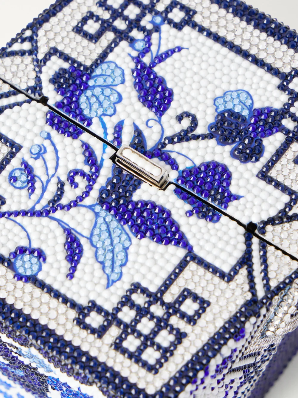 Close-up detail of the Judith Leiber Couture Blue Dragon Take Away Box Crystal-embellished Silver-tone Clutch