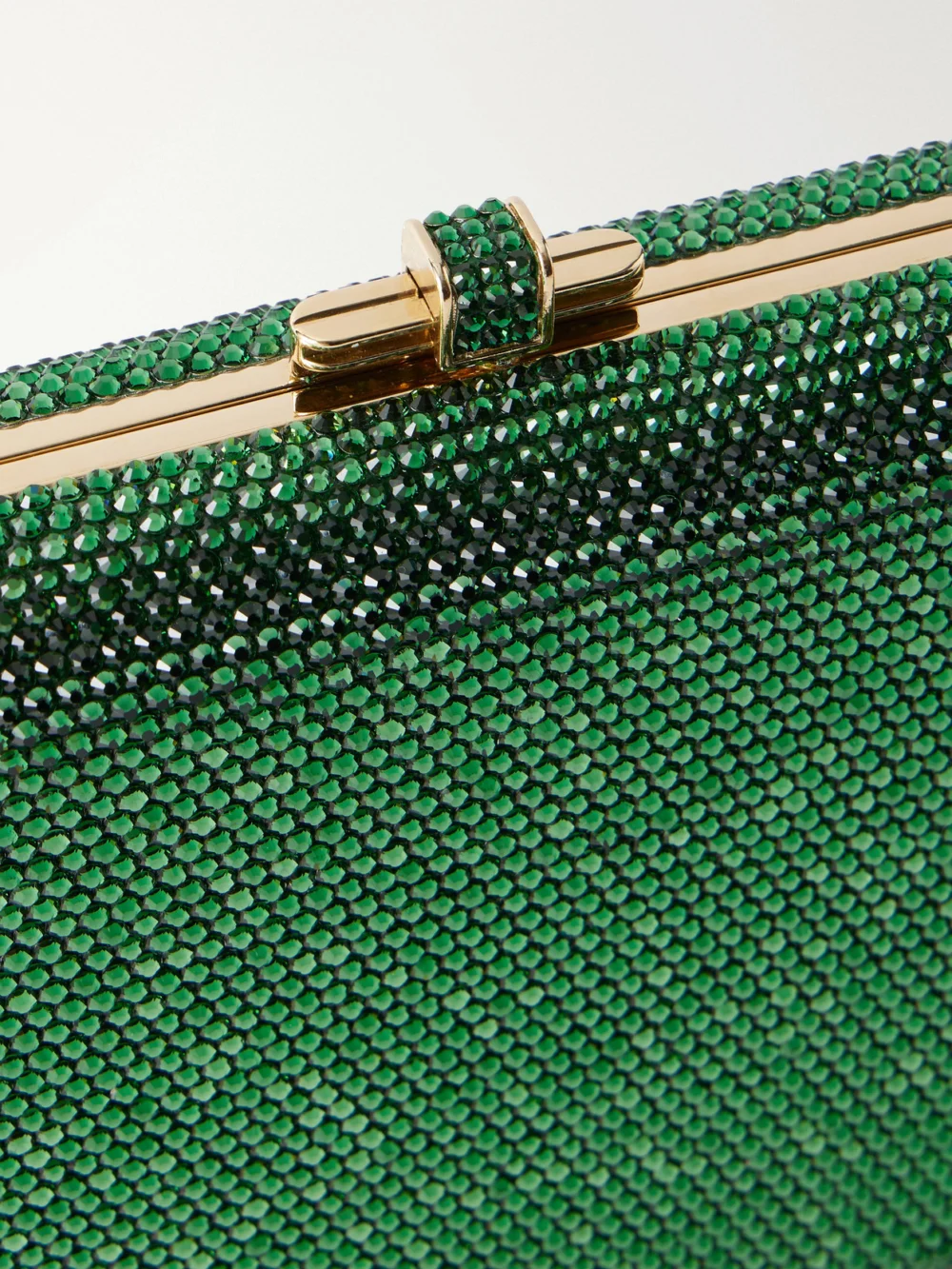 Close-up detail of the Judith Leiber Couture Slim Slide Crystal-embellished Gold-tone Clutch