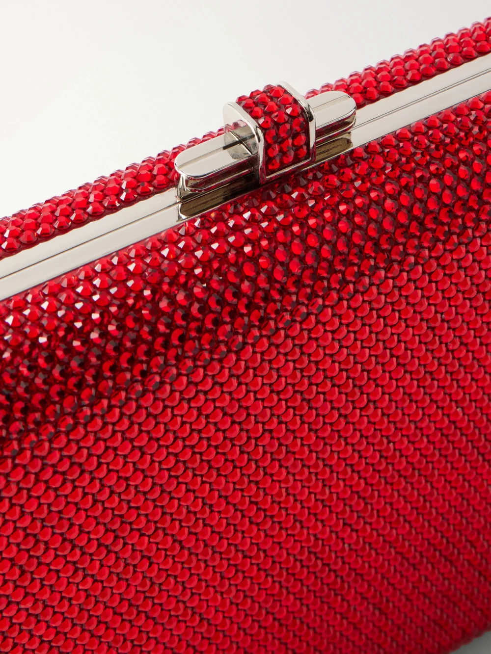 Close-up detail of the Judith Leiber Couture Slim Slide Crystal-embellished Silver-tone Clutch