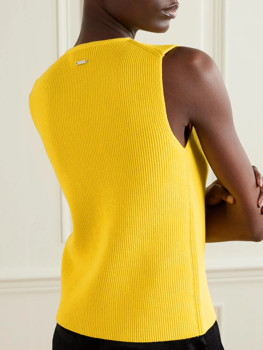 Back view of the JW Anderson Tie-detailed Ribbed Cotton-blend Top