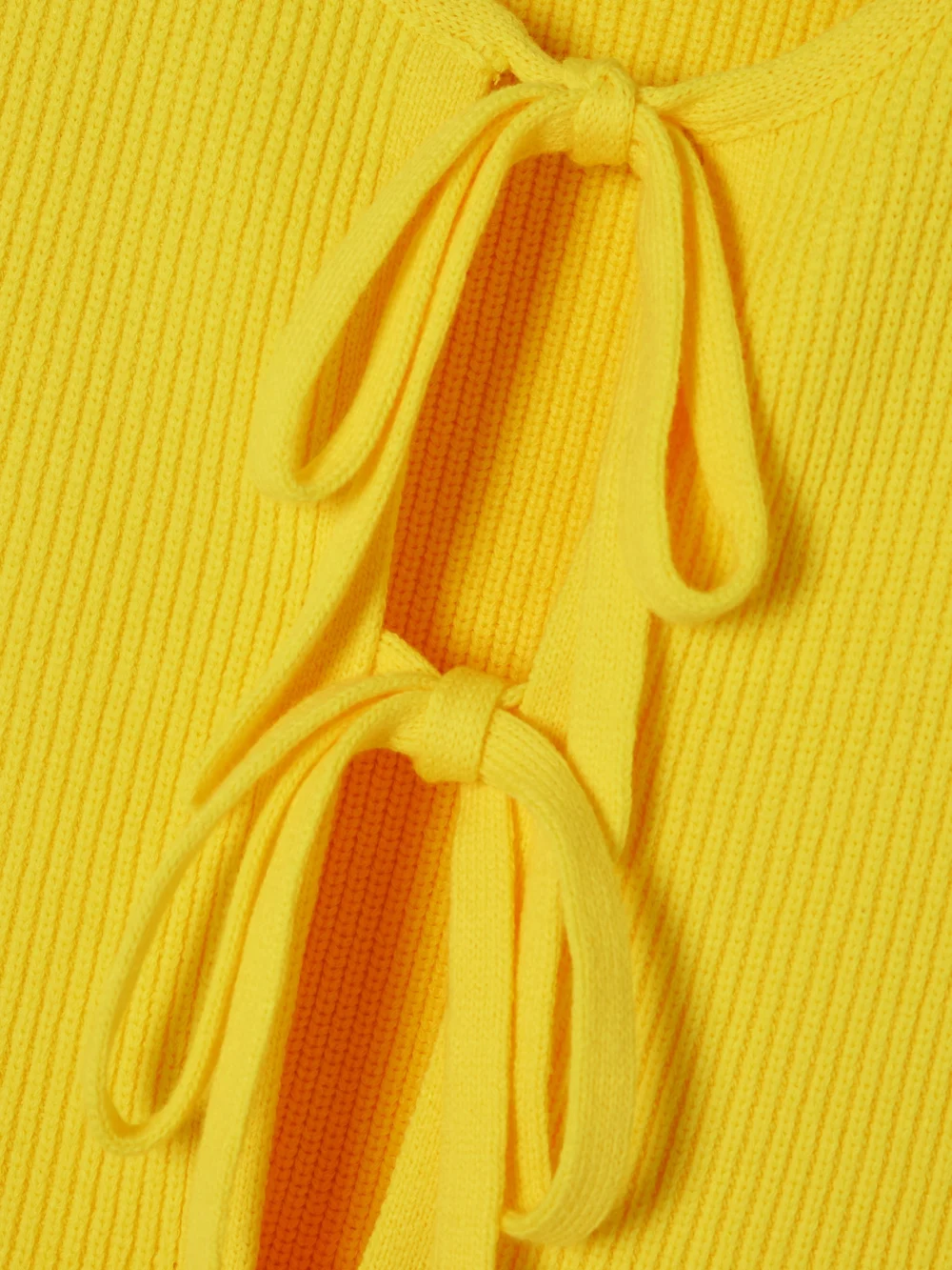 Close-up detail of the JW Anderson Tie-detailed Ribbed Cotton-blend Top