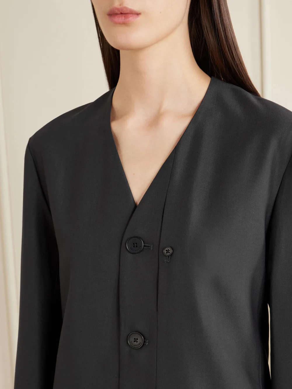 Close-up detail of the Kallmeyer Jamie Tie-detailed Cady Blazer