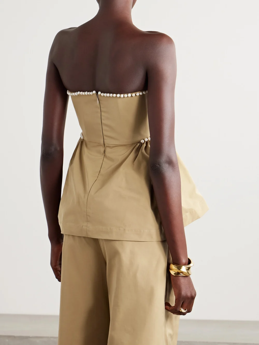 Back view of the Kika Vargas Hebe Strapless Faux Pearl-embellished Woven Top