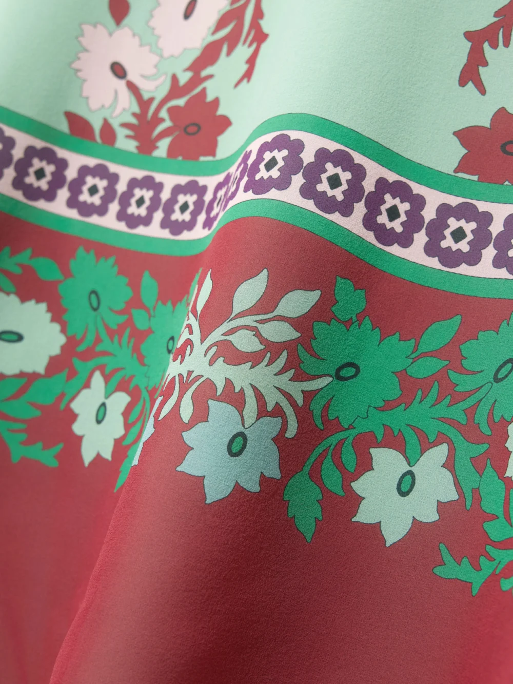 Close-up detail of the La DoubleJ Maria Printed Silk Midi Dress