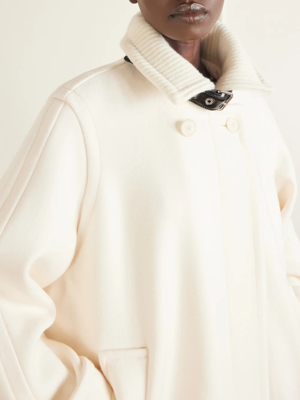 Close-up detail of the Lanvin Belted Leather-trimmed Wool Trench Coat