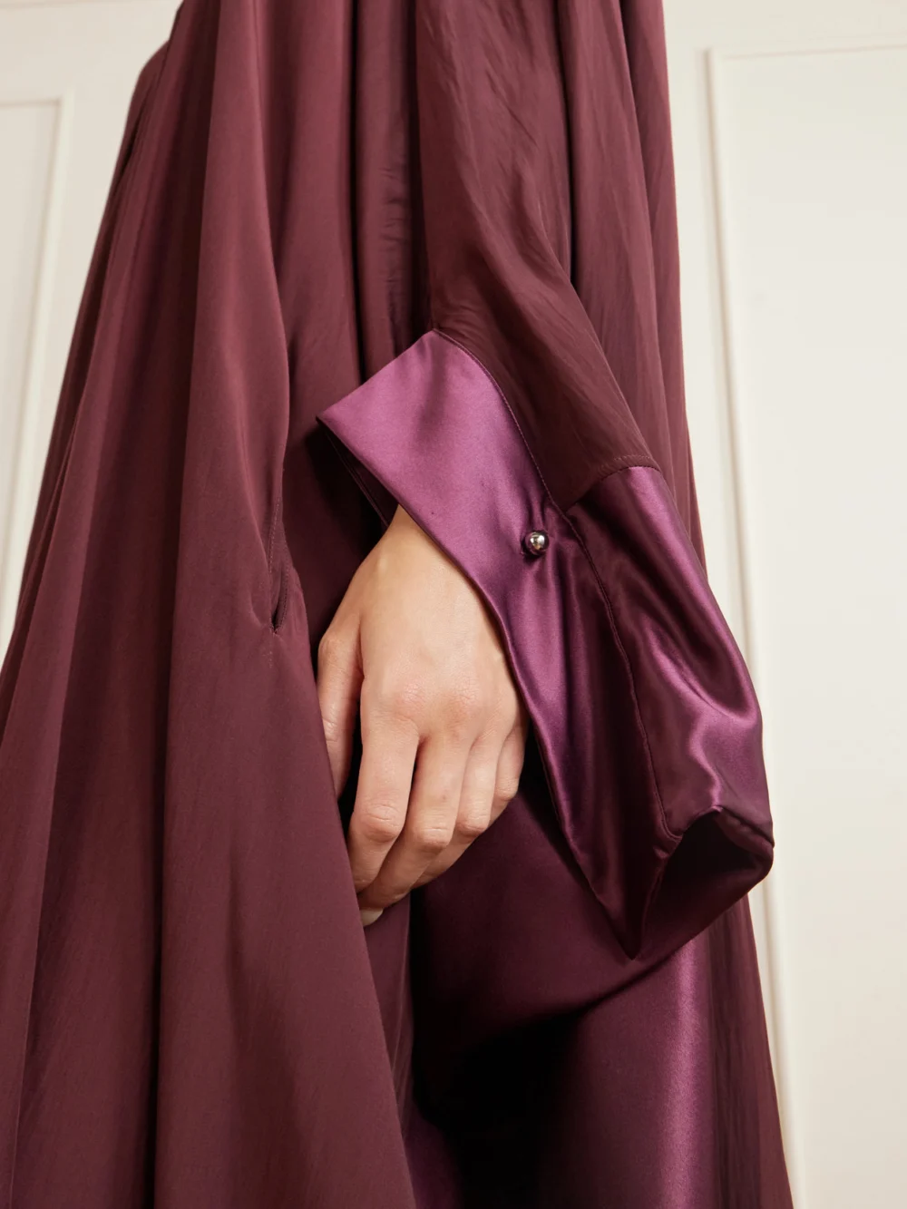 Close-up detail of the Lanvin Pleated Satin-trimmed Charmeuse Gown