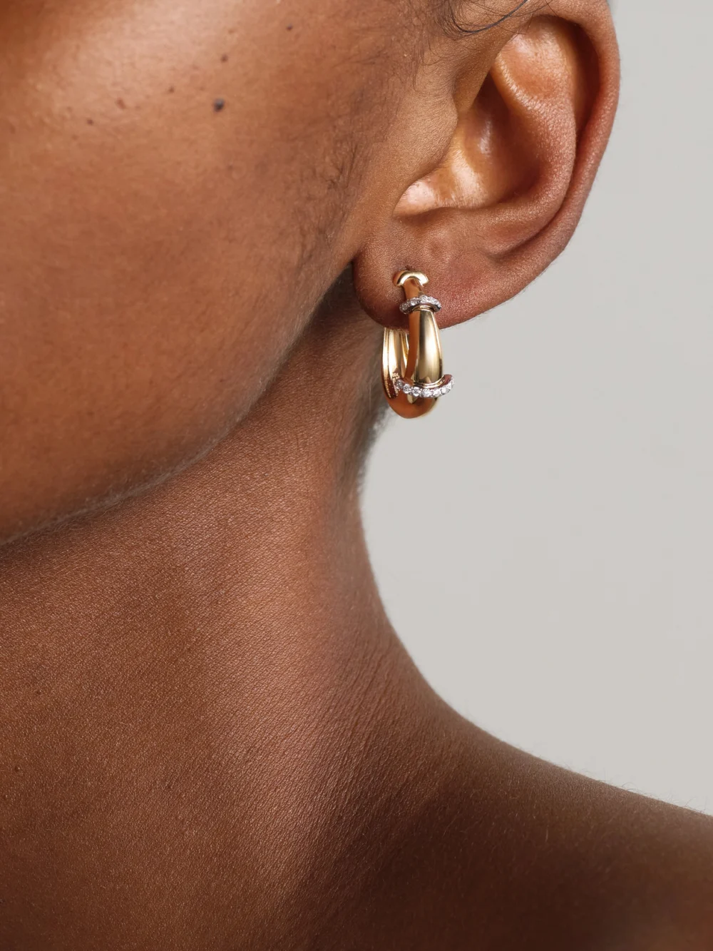 L'Atelier Nawbar Buoy Large 18-karat Yellow and Rhodium-plated White Gold Diamond Hoop Earrings, styled view