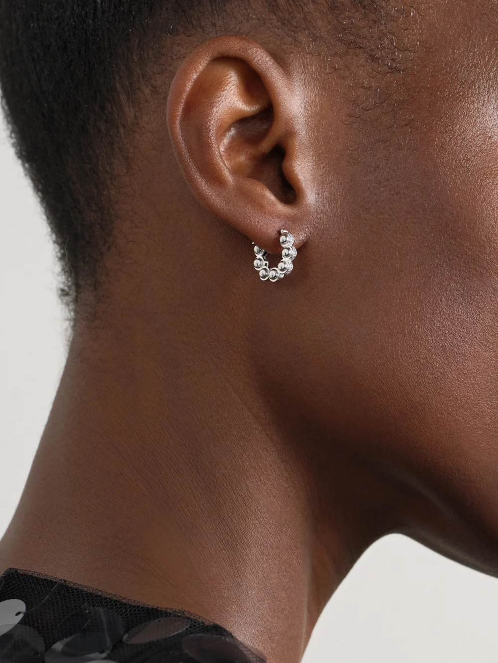 L'Atelier Nawbar The Atom 18-karat White Gold Diamond Hoop Earrings, styled view