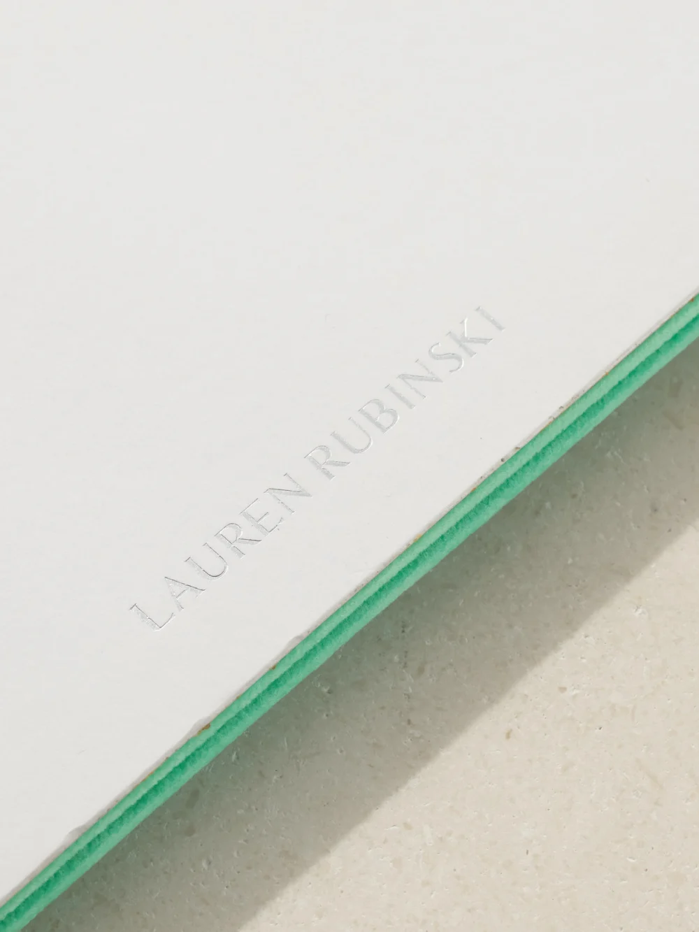 Close-up detail of the Lauren Rubinski Faux Suede Jewelry Tray