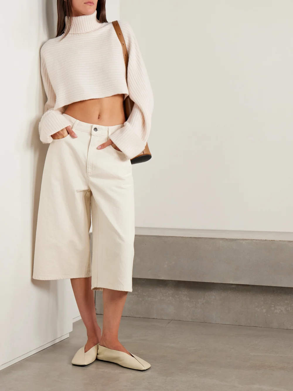 Le Kasha Gida Cropped Ribbed Organic Cashmere Turtleneck Sweater, worn by a model