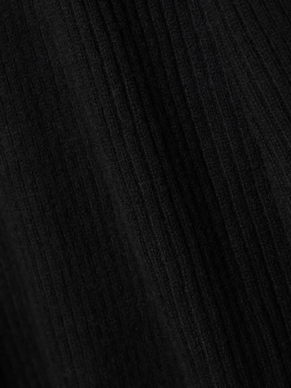 Close-up detail of the Le Kasha Logan Ribbed Organic Cashmere Midi Dress