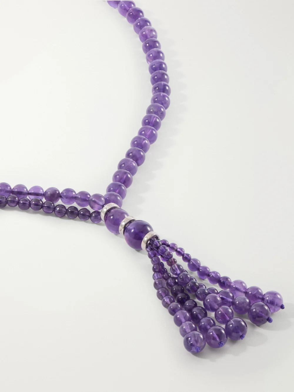 Close-up detail of the Le Sundial Venice Opera Tasseled Sterling Silver Amerthyst Necklace