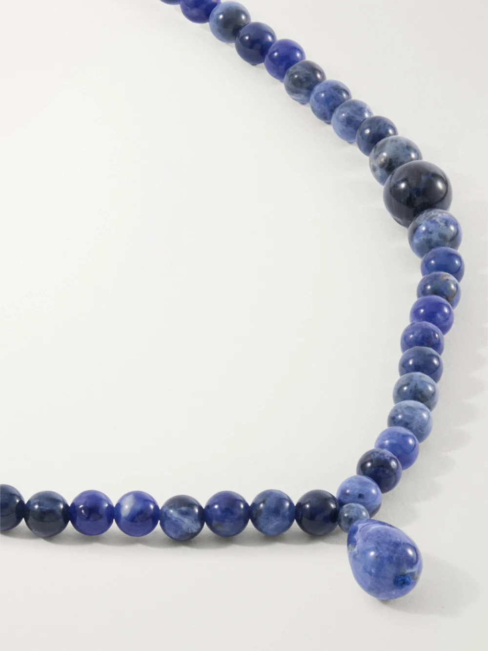 Close-up detail of the Le Sundial Wave Sterling Silver and Sodalite Beaded Necklace