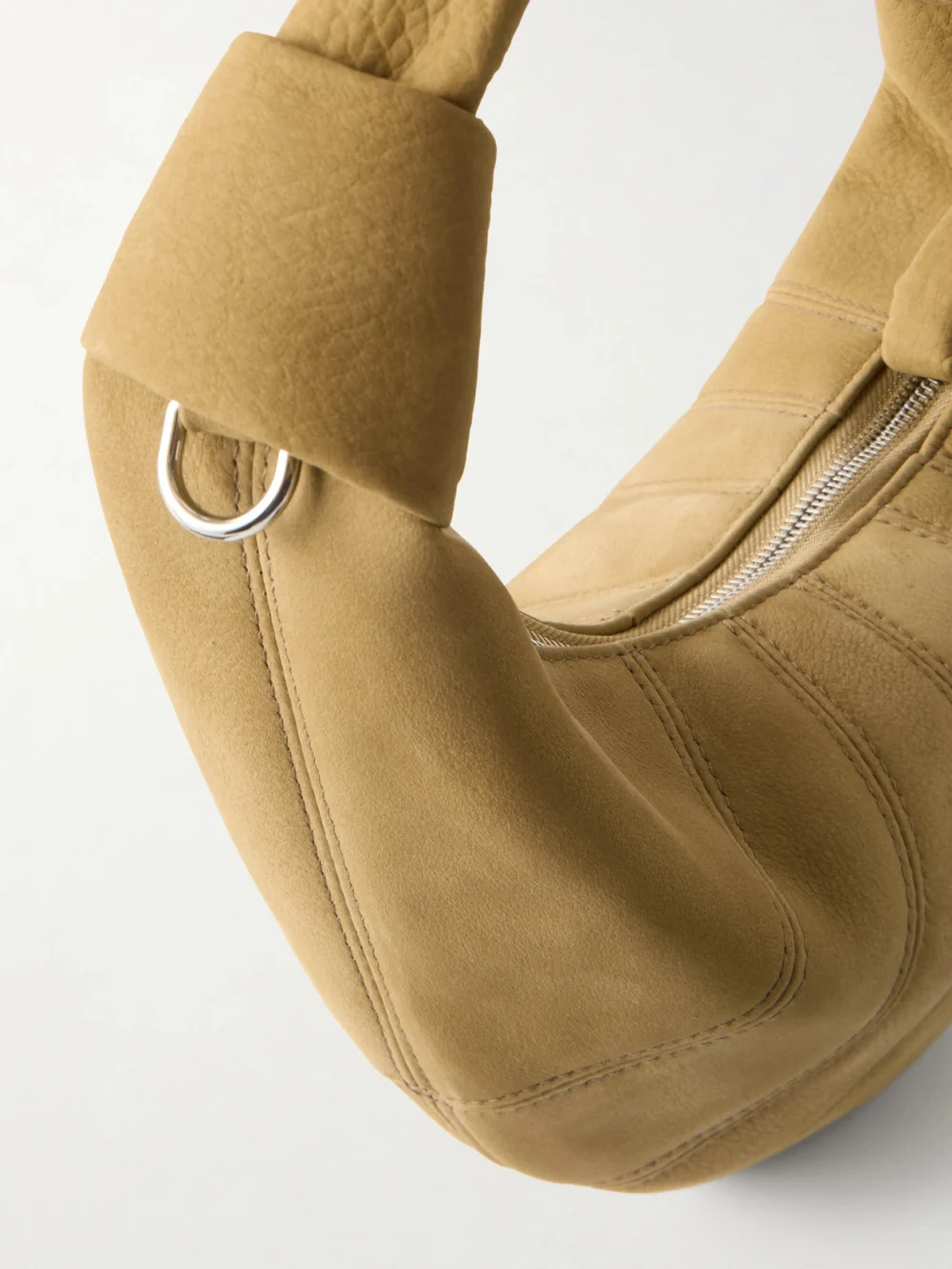 Close-up detail of the Lemaire Fortune Croissant Mini Leather Shoulder Bag