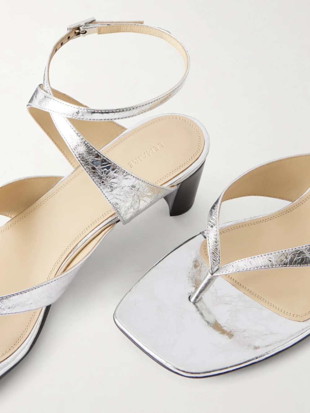Close-up detail of the Lemaire Tong 50 Metallic-leather Sandals
